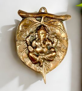 Kamalasana Ganesha Wall Hanging on leaf : Finely engraved wall hanging of lord ganesha which will look fantastic on your wall